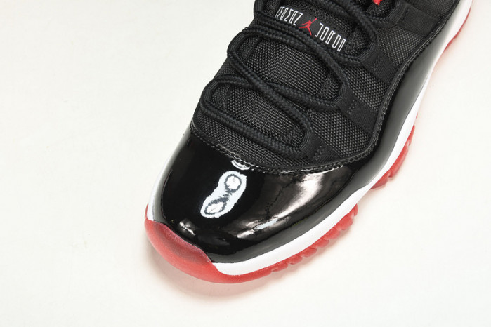 air jordan 11 retro low "bred" black/ red mens 528895-012
